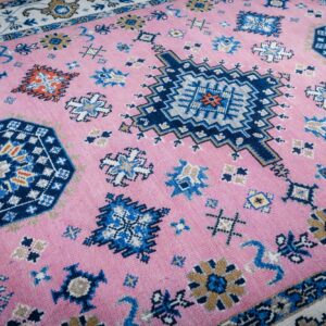 Pink ivory Kazak rug field and medallion detail
