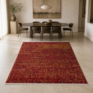 Red sari-silk Anand rug in a gallery dining room