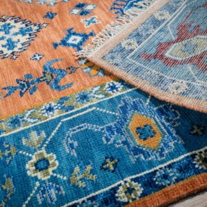 Rust blue Kazak rug back and border detail