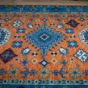Rust blue Kazak rug field and medallion detail