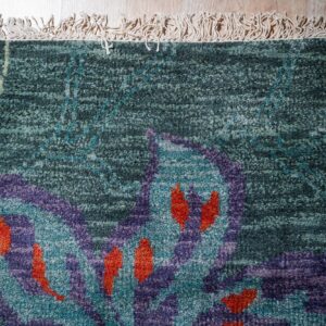 Teal contemporary floral rug corner detail