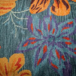 Teal contemporary floral rug blossom motif close-up