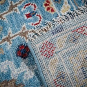 Turquoise Oushak rug back and fringe detail