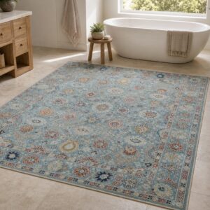 Turquoise Oushak floral rug styled in a spa bathroom