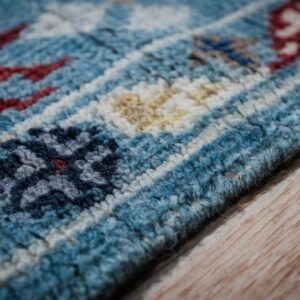 Turquoise Oushak rug border close-up