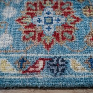 Turquoise Oushak rug border motif close-up