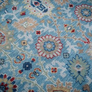 Turquoise Oushak rug floral field close-up