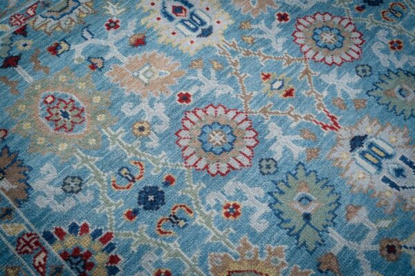 Turquoise oushak rug floral field close-up
