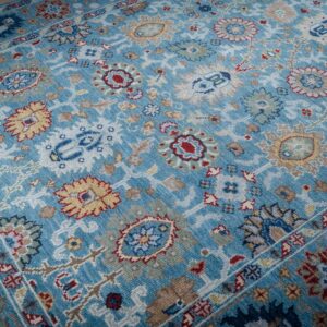 Turquoise Oushak rug allover floral field detail