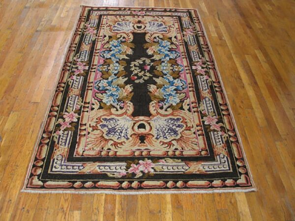1760s black floral medallion antique english axminster rug 4' x 7' knotted wool carpet 2 1760s black floral medallion antique english axminster rug 4' x 7' knotted wool carpet - detail view 1