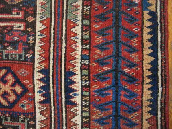 1890s multicolor geometric tribal antique persian kurdish rug 4'6" x 7'8" handknotted wool carpet 6 1890s multicolor geometric tribal antique persian kurdish rug 4'6" x 7'8" handknotted wool carpet - detail view 5