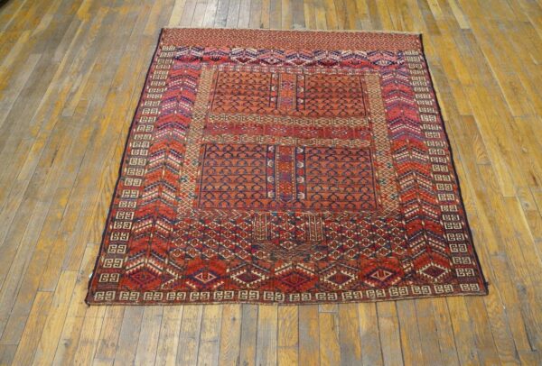 1900s red geometric antique baluch turkmen tekke ensi rug 4' 1'' x 4' 6'' handknotted wool carpet - detail view 1