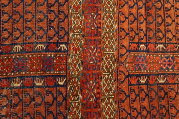 1900s red geometric antique baluch turkmen tekke ensi rug 4' 1'' x 4' 6'' handknotted wool carpet - detail view 4