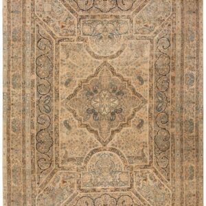 Authentic Medallion Design on a Ivory Open Field Antique Persian Kerman Rug