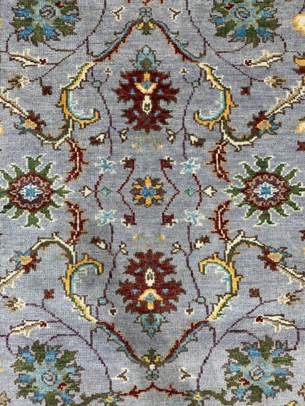 Dahlia oriental gray hand knotted wool rug 5 Dahlia oriental gray hand knotted wool rug, a gray wool rug with a traditional oriental pattern in a brightly lit living room