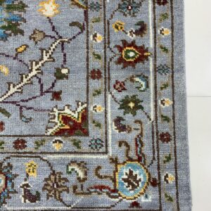 Dahlia Oriental Gray Hand Knotted Wool Rug showcasing traditional patterns in muted grays for a sophisticated timeless ambiance