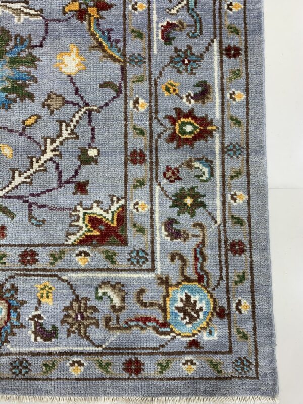 Dahlia oriental gray hand knotted wool rug 4 Dahlia oriental gray hand knotted wool rug showcasing traditional patterns in muted grays for a sophisticated timeless ambiance