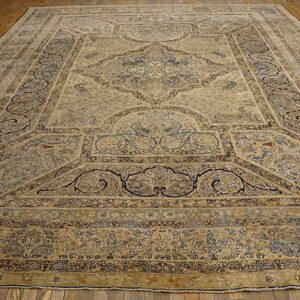 Authentic Medallion Design on a Ivory Open Field Antique Persian Kerman Rug - detail view 1