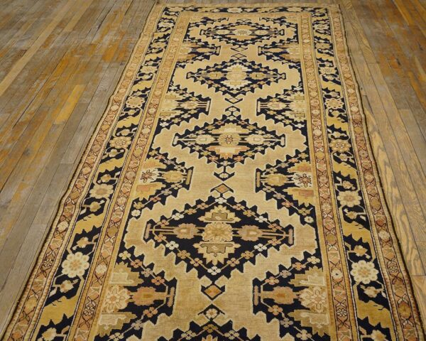 Charming tan-camel background color and black border with rhombus pattern antique caucasian karabagh rug - detail view 1