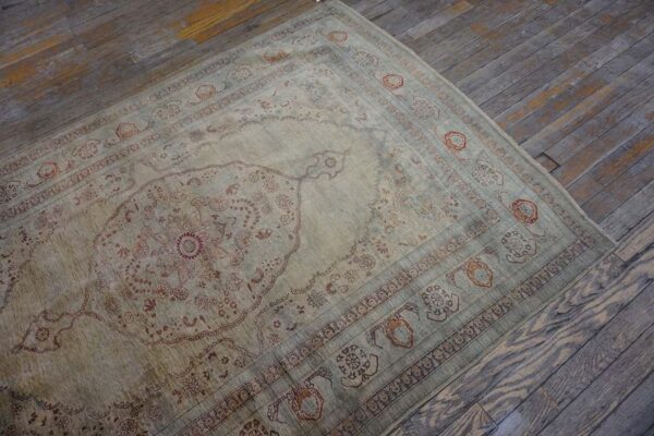 Elegant intricate ivory background color in a medallion pattern antique persian tabriz rug - detail view 6