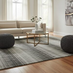 Gray contemporary geometric loom-check wool and viscose area rug styled in a living room