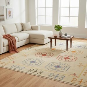 Beige reversible kilim wool rug OSK1IV shown in a styled interior