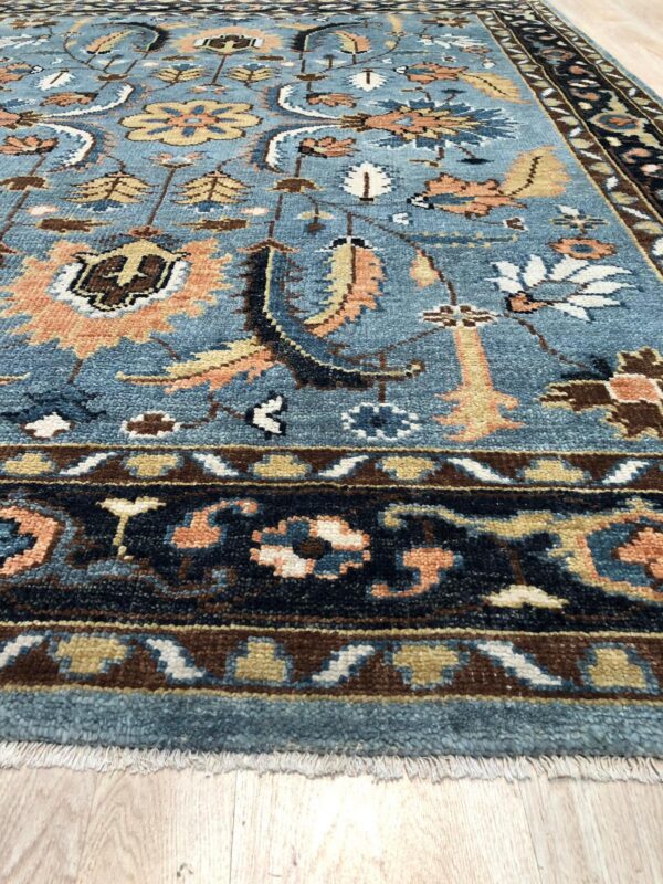 Ashford gray navy traditional hand knotted wool rug 4 Corner detail of the kr110gy gray navy hand-knotted wool rug showing pile and border