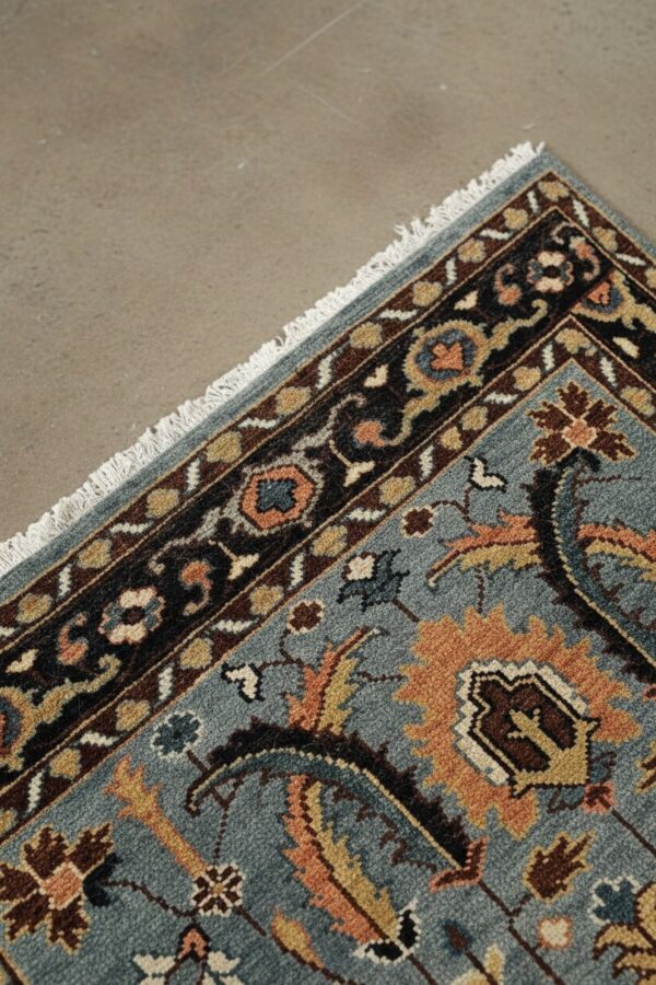 Ashford gray navy traditional hand knotted wool rug 7 Gray and navy traditional hand-knotted wool rug kr110gy shown in a styled interior setting
