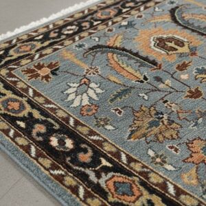 Gray and navy traditional hand-knotted wool rug KR110GY in a decorated room