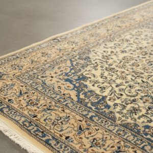 Ivory Naiin traditional oriental hand-knotted wool and silk area rug