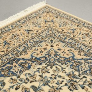Ivory Naiin traditional oriental hand-knotted wool and silk area rug