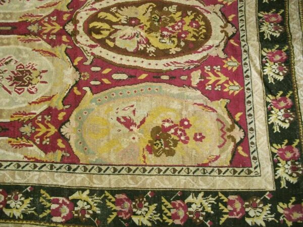 Remarkable red-ruby background color with black border and medallion/crest design antique caucasian karabagh rug 4 Remarkable red-ruby background color with black border and medallion/crest design antique caucasian karabagh rug - detail view 3
