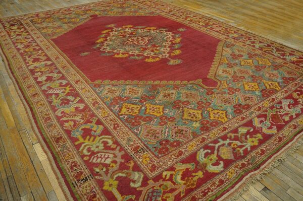 Spellbinding red-raspebery fiedl with delicate medallion pattern antique turkish ghiordes oushak rug 2 Spellbinding red-raspebery fiedl with delicate medallion pattern antique turkish ghiordes oushak rug - detail view 1
