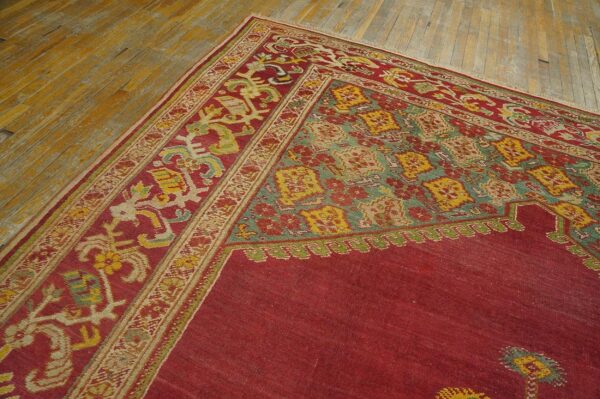 Spellbinding red-raspebery fiedl with delicate medallion pattern antique turkish ghiordes oushak rug 4 Spellbinding red-raspebery fiedl with delicate medallion pattern antique turkish ghiordes oushak rug - detail view 3