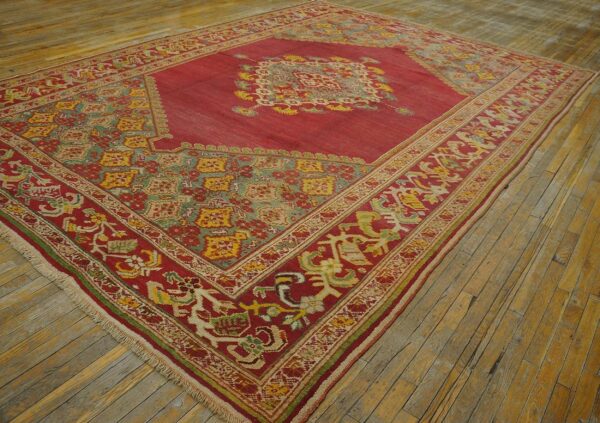 Spellbinding red-raspebery fiedl with delicate medallion pattern antique turkish ghiordes oushak rug 6 Spellbinding red-raspebery fiedl with delicate medallion pattern antique turkish ghiordes oushak rug - detail view 5