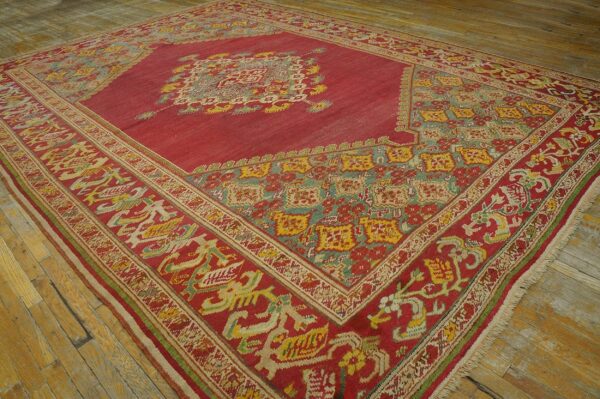 Spellbinding red-raspebery fiedl with delicate medallion pattern antique turkish ghiordes oushak rug 7 Spellbinding red-raspebery fiedl with delicate medallion pattern antique turkish ghiordes oushak rug - detail view 6