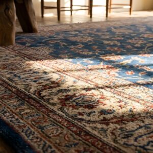 1880s Blue Hand Knotted Pile Rectangle Antique Wool Allover Floral Rug (SKU 22780) - in-room detail