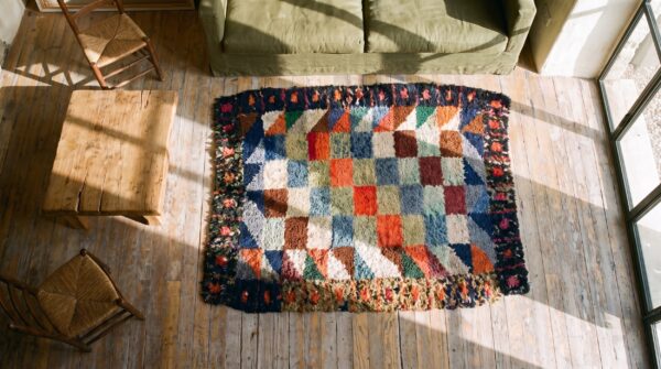 Antique 1890s american hooked multicolor wool square scatter rug (sku 20501) - styled overhead view