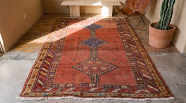 Antique 1890s n. W. Persian geometric red wool hallway runner rug 2 Antique 1890s n. W. Persian geometric red wool hallway runner rug (sku 21608) - styled overhead view