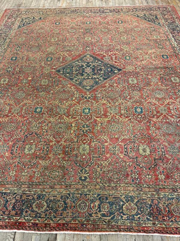 1890s red field medallion large scale antique sultanabad knotted wool rug 6 1890s red field medallion large scale antique sultanabad knotted wool rug - detail view 5