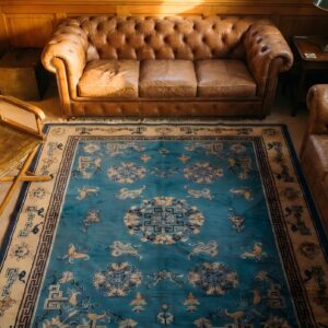 1900s Hand Knotted Pile Wool Antique Floral Medallion Rectangle Blue Rug (SKU 22946) - styled overhead view