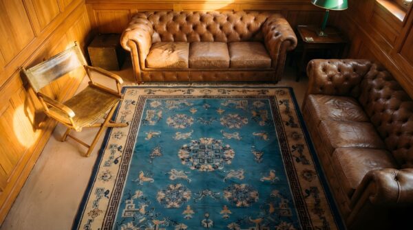 1900s hand knotted pile wool antique floral medallion rectangle blue rug 2 1900s hand knotted pile wool antique floral medallion rectangle blue rug (sku 22946) - styled overhead view