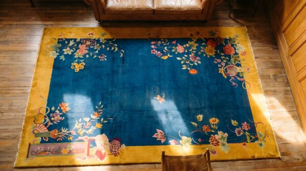 Hand knotted pile 1920s antique floral wool blue rectangle rug 2 Hand knotted pile 1920s antique floral wool blue rectangle rug (sku 22149) - styled overhead view
