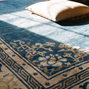 1920s Floral Medallion Wool Antique Hand Knotted Blue Square Rug (SKU 25723) - in-room detail