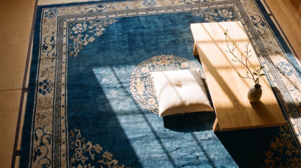 1920s floral medallion wool antique hand knotted blue square rug (sku 25723) - styled overhead view