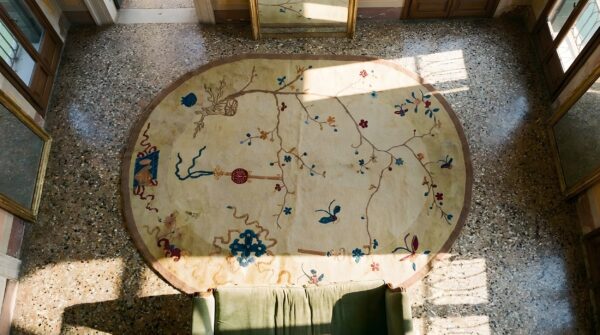 Antique 1920s ivory beige cream white oval hand knotted wool deco chinese rug 2 Antique 1920s ivory beige cream white oval hand knotted wool deco chinese rug (sku 23776) - styled overhead view