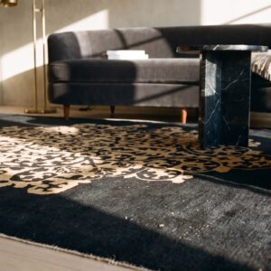 1920s Hand Knotted Pile Antique Rectangle Wool Black Floral Medallion Rug (SKU 25492) - in-room detail