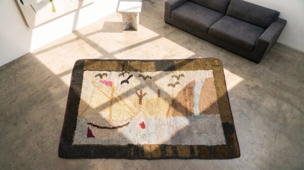 1920s small scatter size american ivory hooked antique wool rug (sku 19799) - styled overhead view