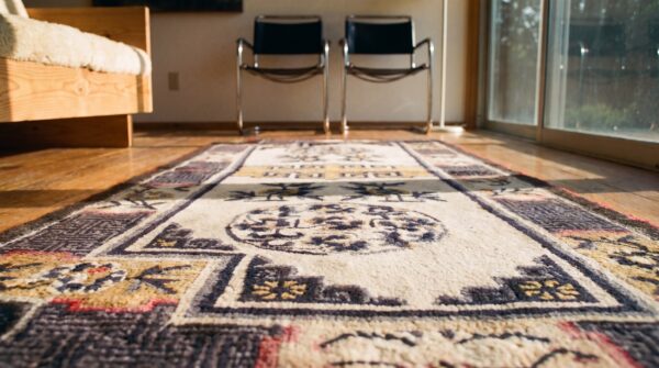 1930s chinese geometric medallion hand knotted pile ivory beige cream white antique wool rug 8 1930s chinese geometric medallion hand knotted pile ivory beige cream white antique wool rug (sku 21984) - in-room detail