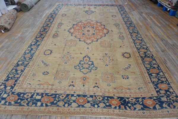 1930s classic allover medallion beige field antique knotted mahal rug - detail view 1